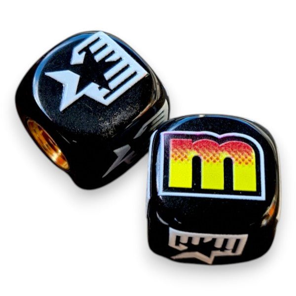 Mongoose - 83-85 Logo Dice Tire Valve Caps (Pair) - BLACK - Bmx Products AU