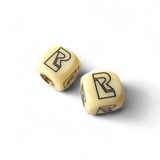 Redline - R Logo Dice Tire Valve Caps (Pair) - Bone White - old school bmx - Bmx Products AU