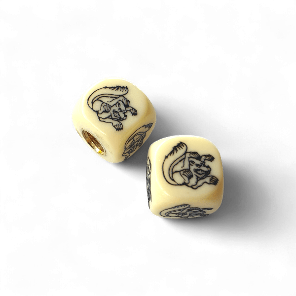 Mongoose - Maurice logo Dice Tire Valve Caps (Pair) - Bone White - old school bmx - Bmx Products AU