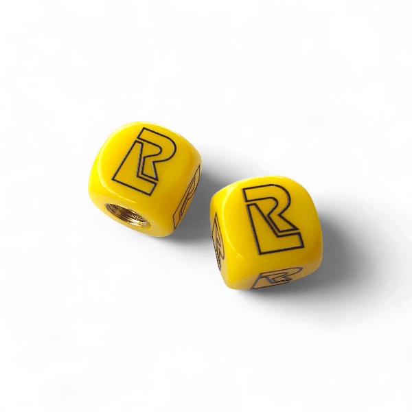 Redline - R Logo Dice Tire Valve Caps (Pair) - YELLOW - old school bmx - Bmx Products AU